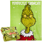 The Grinch throw blanket front view showing full festive design and cozy appeal
