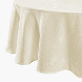 Threadmade Caiden front view on round table showing elegant ivory finish and upscale look