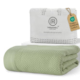 Threadmill blanket front view showing sage green color and stylish appeal