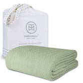 Threadmill sage green blanket front view showing cozy coverage