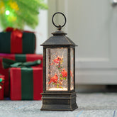 TIJNN front view lantern showing antique bronze finish and festive glow