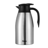 Tiken carafe front view showing silver finish and handle, durable serving