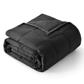 Topblan front view on queen bed showing full coverage and comfort