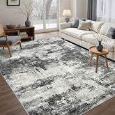 Tosuoka front view of 5x7 abstract rug showing modern black design and versatility