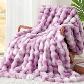 Touchat folded on couch showing plush look and cozy appeal