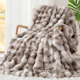 Touchat folded throw on sofa showing plush front and decor benefit