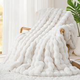 Touchat front view of cream throw blanket showing luxe look and soft texture