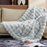 Touchat front view throw blanket showing plush grey fur and cozy appeal