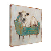Trademark Fine Art front view of cow-in-chair canvas showing playful detail and visual appeal