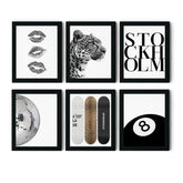 TwoDays front packaging showing six black framed prints and secure mailer benefit