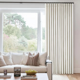 TWODRAPES front panel view showing tailored pinch pleat and cream linen texture for elegant light control
