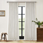 TWODRAPES front view cream curtains showing refined blackout benefit