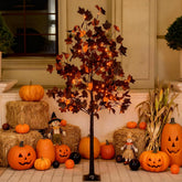 TYBEEU tree front view showing pre-lit LEDs and spooky silhouette for instant atmosphere