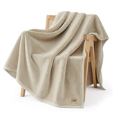 UGG Coco throw folded on table showing plush feel and cozy look