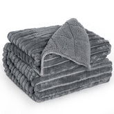 UINIU front view showing blanket on bed and cozy coverage benefit