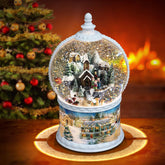 Ulaluckor front view globe showing lighted winter village and motion