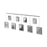 Umbra Exhibit front view showing nine black frames and metal ledge for cohesive display
