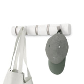 Umbra front view of Flip coat rack showing sleek white nickel finish and tidy profile