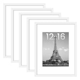 upsimples white frames gallery wall showing cohesive display and clean style