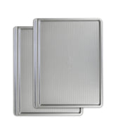 USA Pan front view large cookie sheet showing full baking surface and benefit of even heating