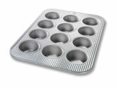 USA Pan front view of 12-well muffin pan showing durable finish and uniform cups