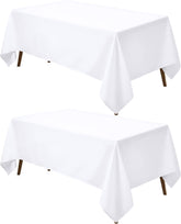 Utopia Kitchen front view of two white rectangle tablecloths, presents neat table styling