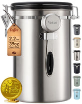 Veken front view canister showing sleek stainless finish and compact footprint