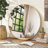 VETROVUE gold mirror front view showing full round reflection and elegant framing