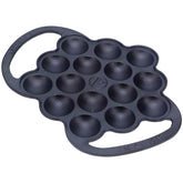 Victoria poffertjes pan front view showing sturdy cast iron and loop handles for easy transfer