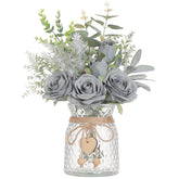 VIERENA front view grey-blue silk roses in glass vase, adds lasting tabletop charm