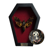 VINADECOR coffin front view showing moth and skull, dramatic focal point