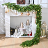 Waipfaru garland front view on mantel shows realistic greenery and festive glow