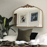 WAMIRRO front view of arched gold mirror highlights vintage elegance and room-brightening benefit