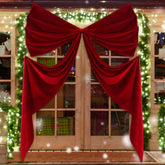 Wavwavw front view of large red velvet bow adds dramatic focal point