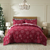 WDCOZY front view of red king quilt showing festive snowflakes and cozy appeal