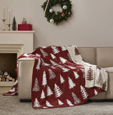 WDCOZY front view draped over couch showing red tree motif and cozy appeal