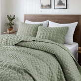 WDCOZY sage green quilt front view showing clean drape and color