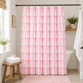 WestWeir front view of pink ruffle shower curtain enhances bathroom style