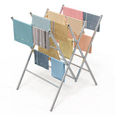 Whitmor oversized drying rack front view showing full hanging capacity