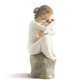 Willow Tree Guardian front view showing seated figure cradling baby, conveys warmth