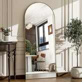 WISSMIELS gold arched mirror front view showing elegant full-length reflection