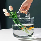 WMM glass purse vase front view showing clear handbag silhouette and elegant display benefit