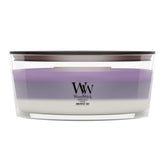 WoodWick front view of Amethyst & Amber ellipse candle showing elegant vessel and crackling wick benefit