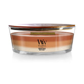 WoodWick front view of ellipse Pumpkin Gourmand candle showing elegant vessel and warmth benefit