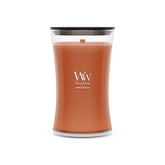 WoodWick(ウッドウィック) front view of hourglass jar showing Pumpkin Praline fragrance and warm decor benefit
