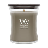 WoodWick Sand & Driftwood hourglass candle front view showing coastal design and scent