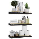 WOPITUES front view of black and gold floating shelves showing elegant storage