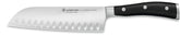Wüsthof Classic IKON santoku front view showing balanced shape and black handle for precise cutting