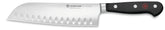 Wüsthof Classic Santoku front view showing balanced profile and sharpness benefit