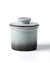 XELA front view of crock showing gradient grey glaze and compact form, beautifies counters